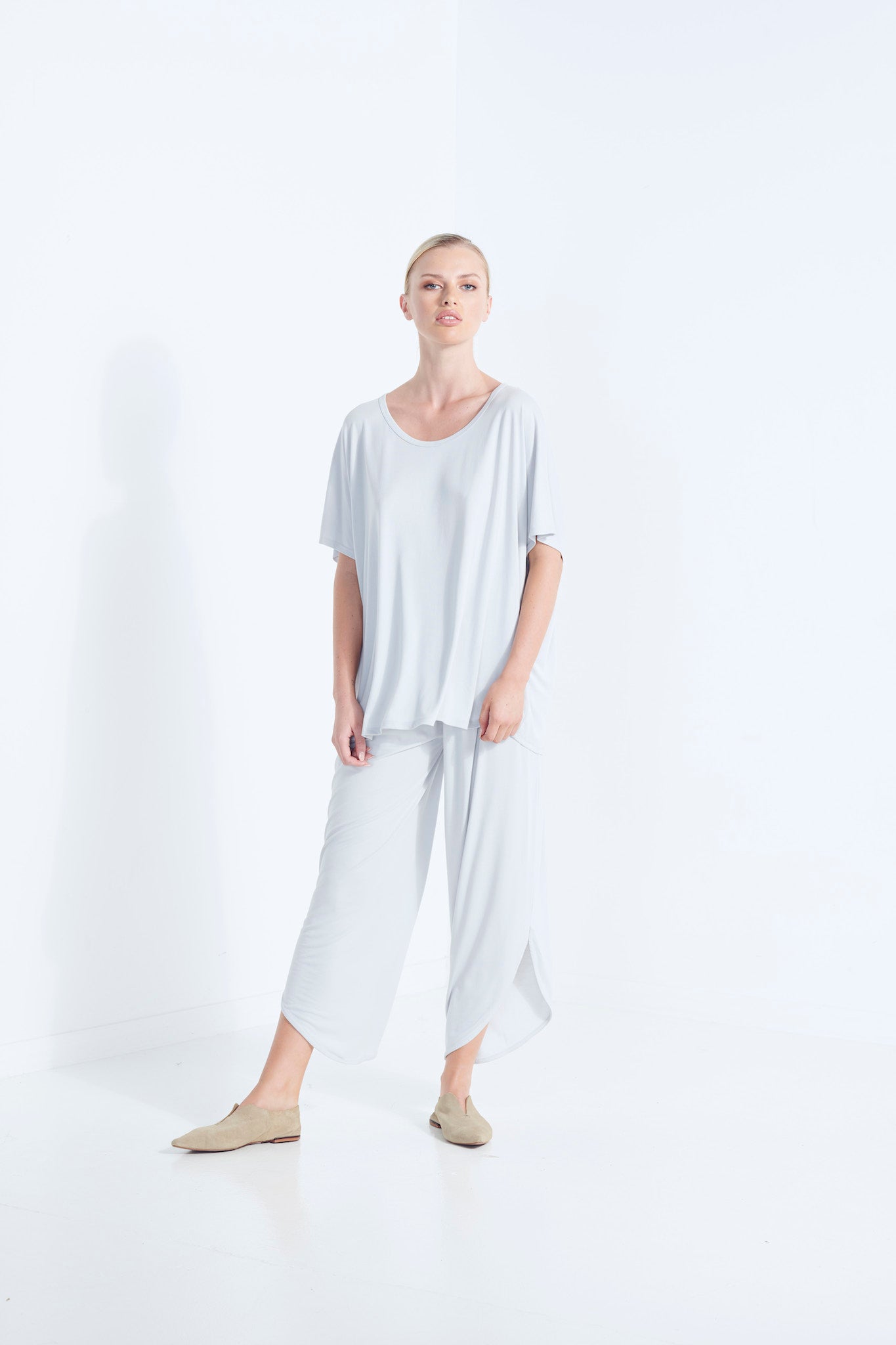 BELU PANT WISP PALE WASHED GREY  LUXURY LOUNGEWEAR RELAXED KNIT PANTS WITH ELASTIC WAIST AND PETAL HEM SLOUCH FRONT VIEW