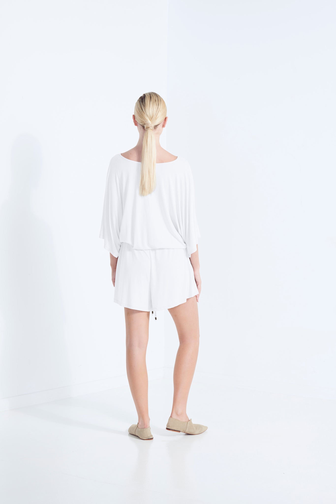 CARRIE PLAYSUIT BEECHWOOD MODAL STRETCH ROMPER  WITH WRAP FRONT TIE WAIST AND POCKETS IN MILKY WHITE DEW BACK VIEW