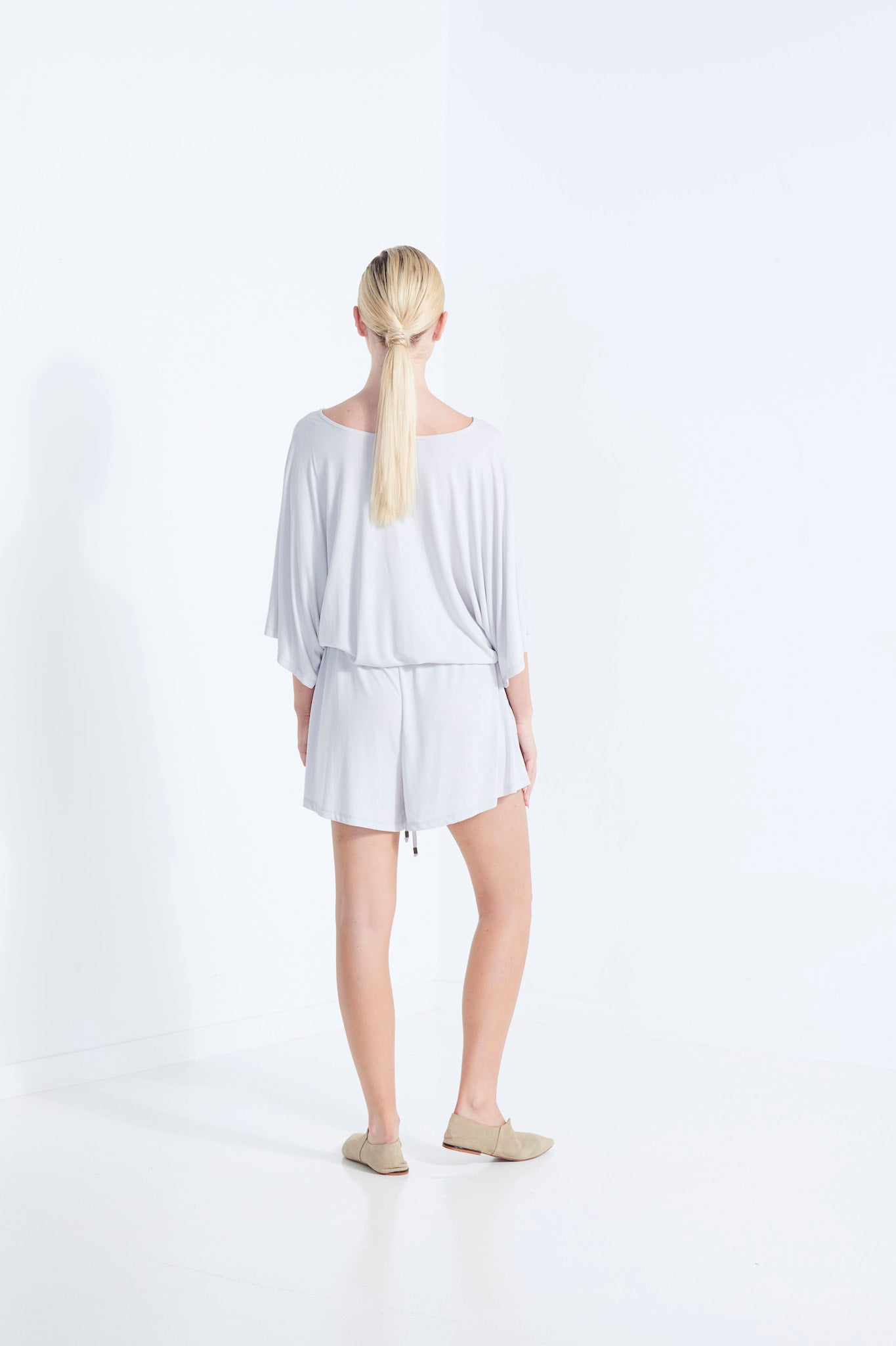 CARRIE PLAYSUIT BEECHWOOD MODAL STRETCH ROMPER  WITH WRAP FRONT TIE WAIST AND POCKETS IN WISP SOFT WASHED GREY  BACK VIEW