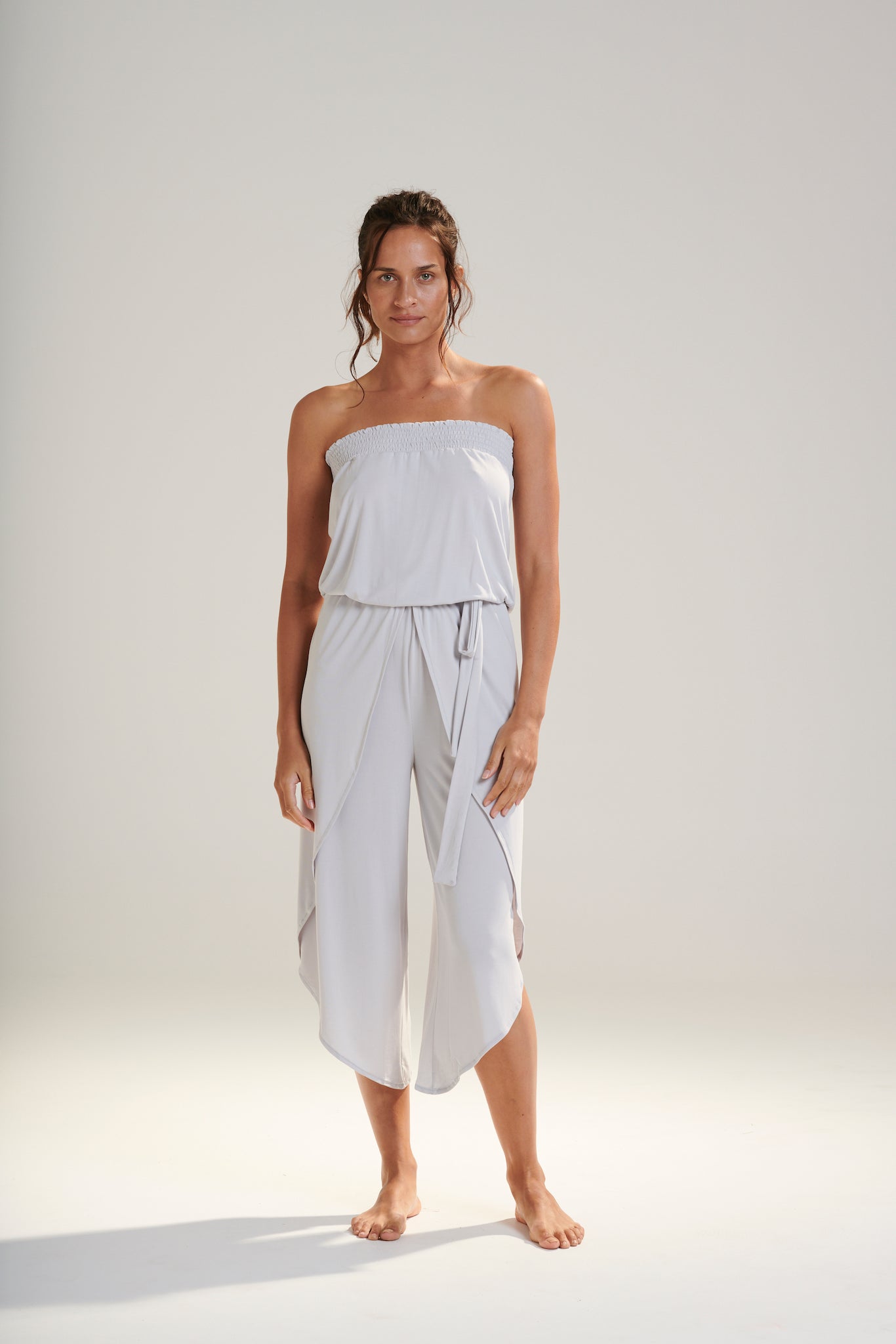 FREYA JUMPSUIT BEECHWOOD MODAL JERSEY SHIRRED BODICE AND PETAL WRAP LEG WITH ELASTIC WAIST AND REMOVABLE TIE IN WISP WASHED PALE GREY RELAXED FRONT VIEW
