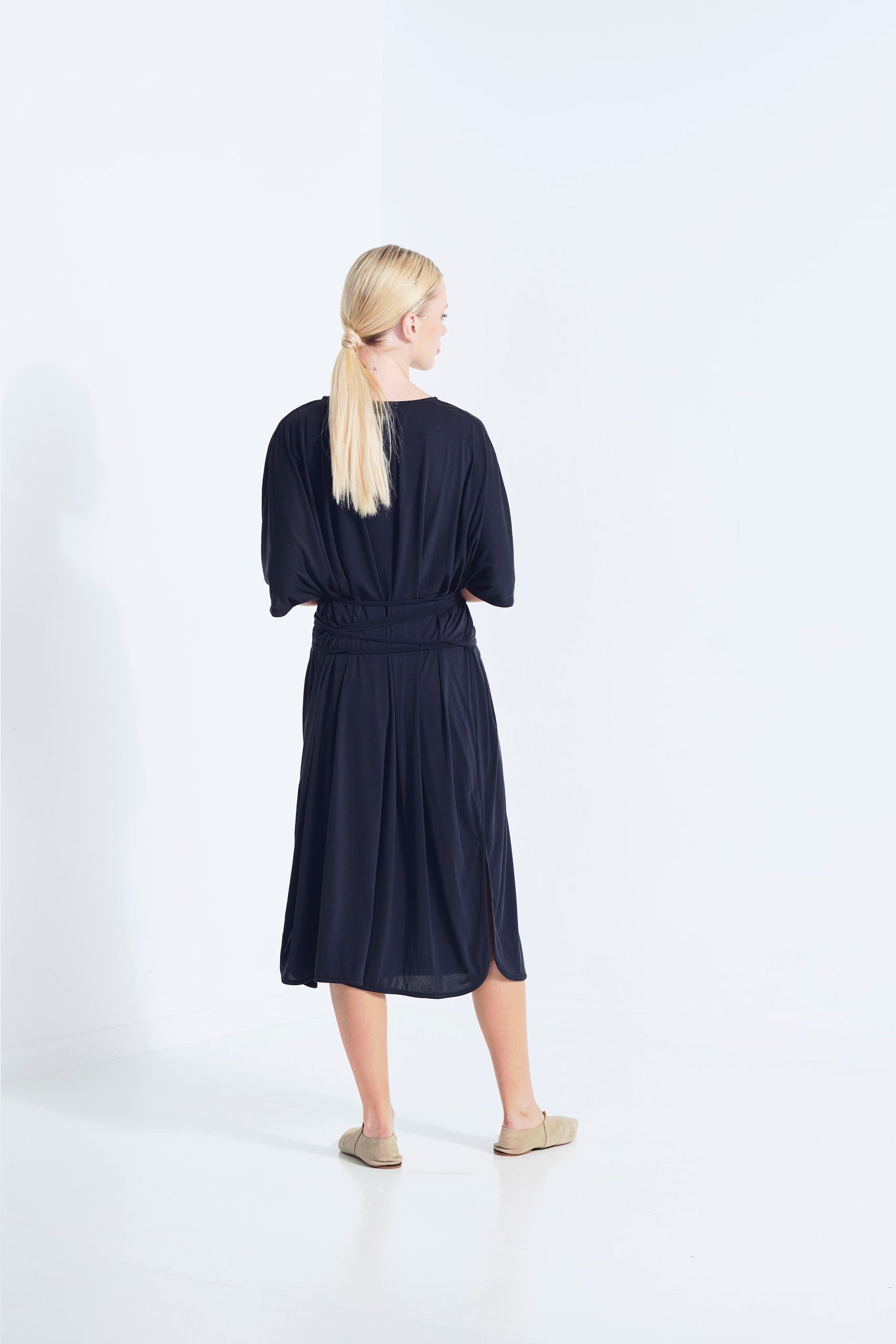 THALIA DRESS BEECHWOOD MODAL WITH WRAP TIE AND HEM SPLITS DARK WASHED BLACK BACK VIEW