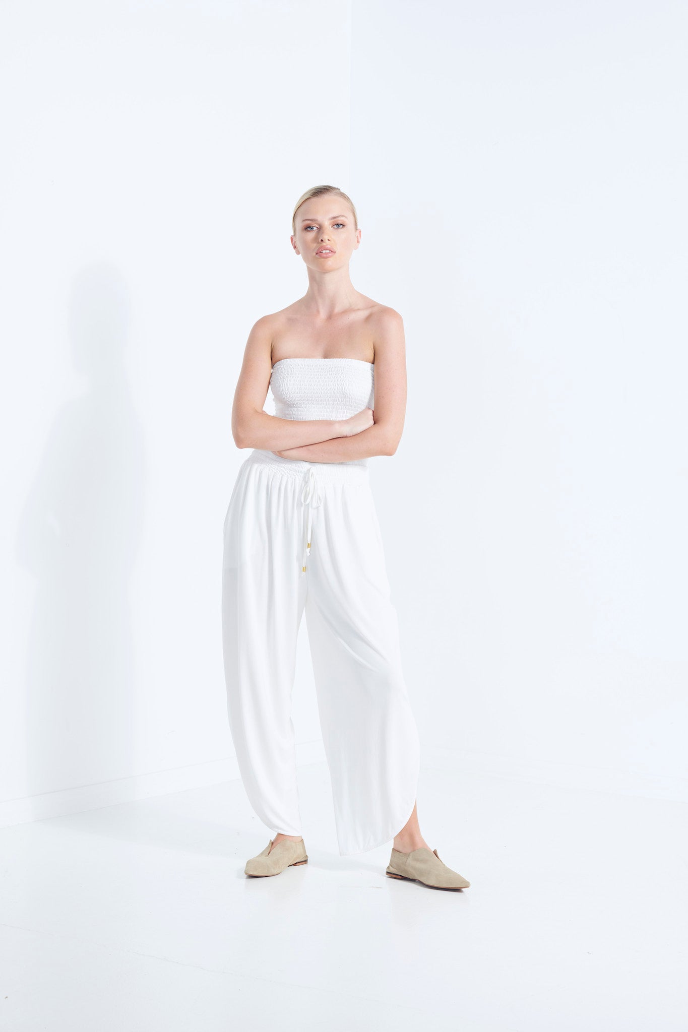BELU PANT DEW MILKY WHITE LUXURY LOUNGEWEAR RELAXED KNIT PANTS WITH ELASTIC WAIST AND PETAL HEM SLOUCH FRONT VIEW