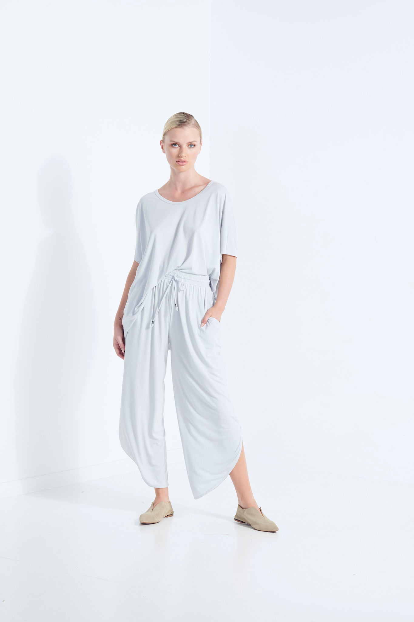 BELU PANT WISP PALE WASHED GREY  LUXURY LOUNGEWEAR RELAXED KNIT PANTS WITH ELASTIC WAIST AND PETAL HEM  FRONT VIEW