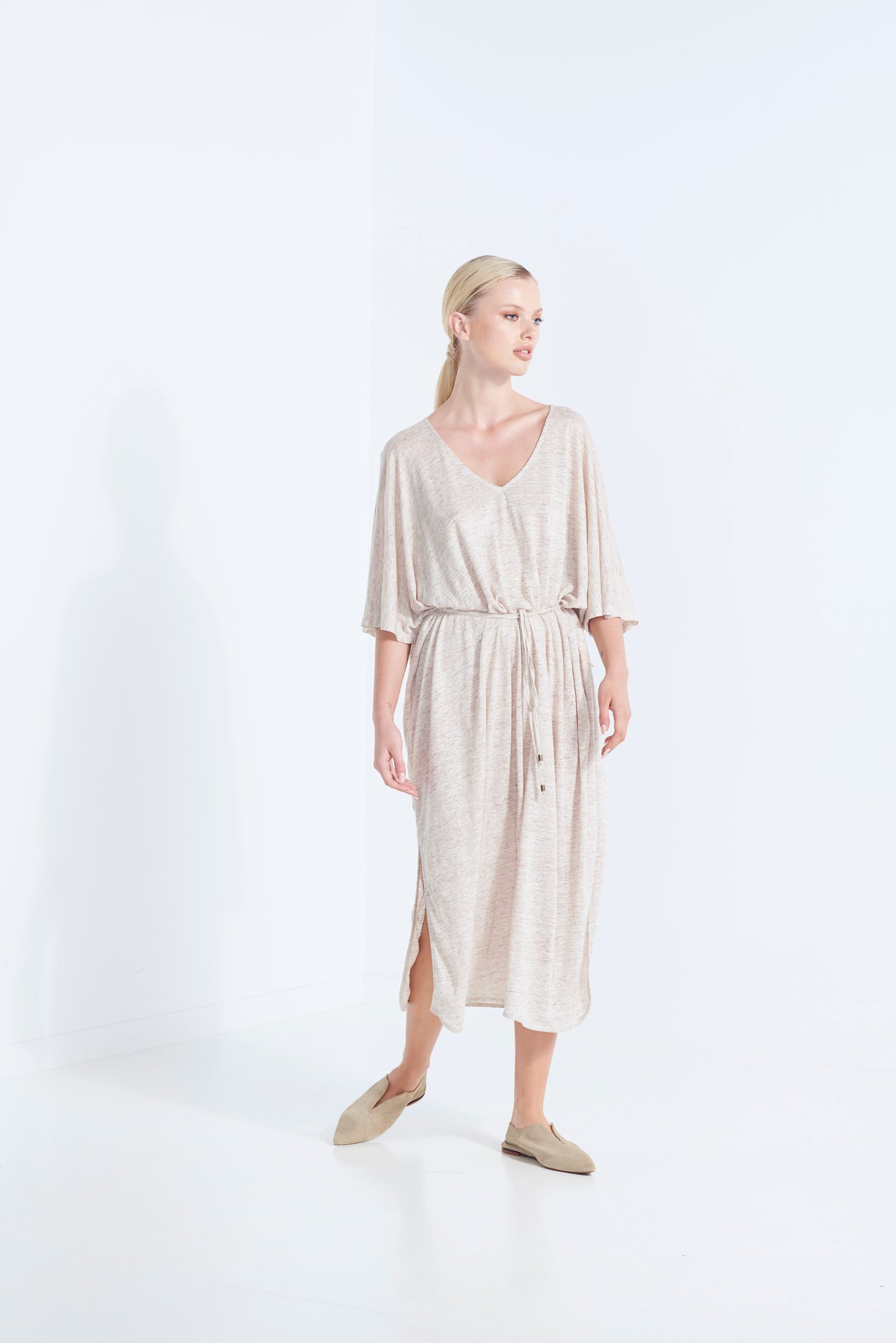 ZEUS DRESS PURE LINEN NATURAL YARN IN WICKER WITH SIDE HEM SCOOP AND SELF FABRIC TIE SIDE FRONT VIEW WITH TIE