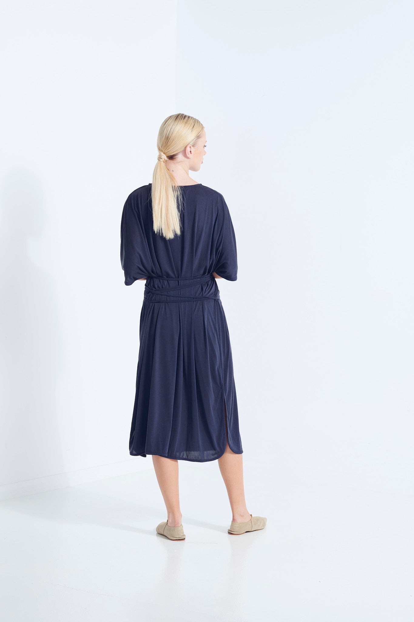 THALIA DRESS BEECHWOOD MODAL WITH WRAP TIE AND HEM SPLITS AEGEAN WASHED NAVY  BACK VIEW
