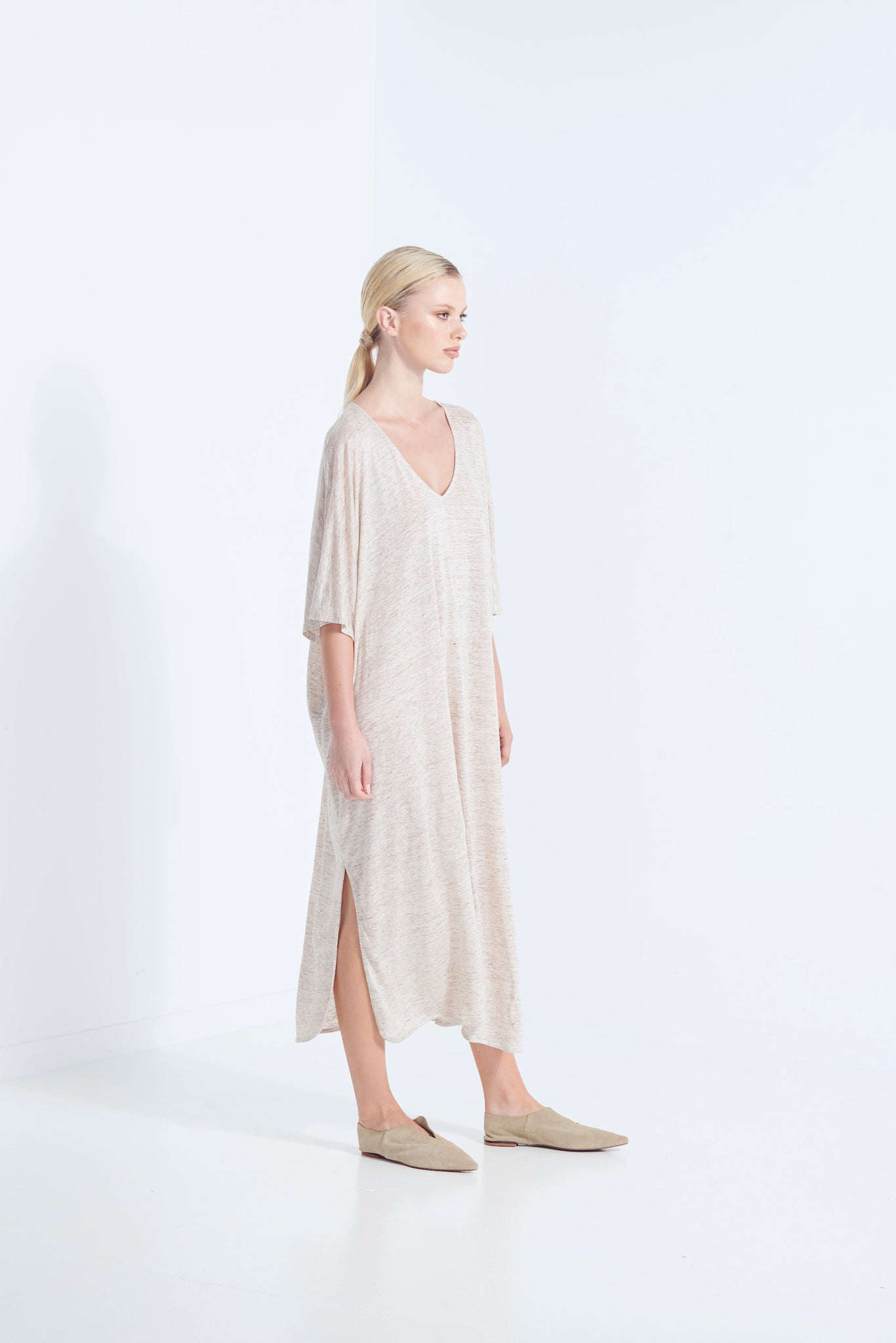 ZEUS DRESS PURE LINEN NATURAL YARN IN WICKER WITH SIDE HEM SCOOP AND SELF FABRIC TIE  SIDE VIEW 